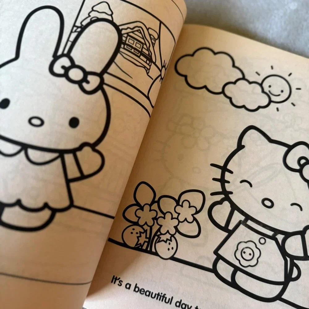2009 New‎ NOS Sanrio Hello Kitty coloring activity book/paper doll